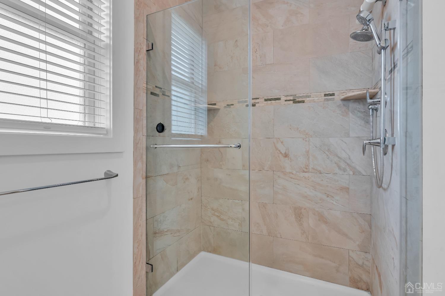 629 Front Street Union Beach, NJ 07735 - Photo 32 of 63 a bathroom with a shower