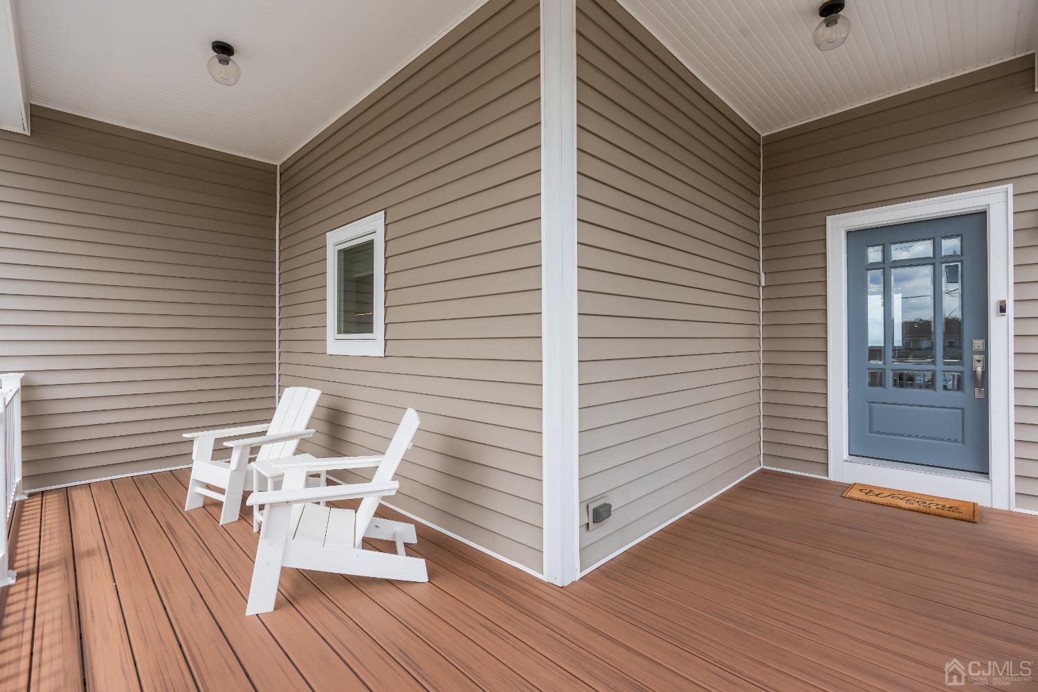 629 Front Street Union Beach, NJ 07735 - Photo 34 of 63 a view of a two chairs in the balcony