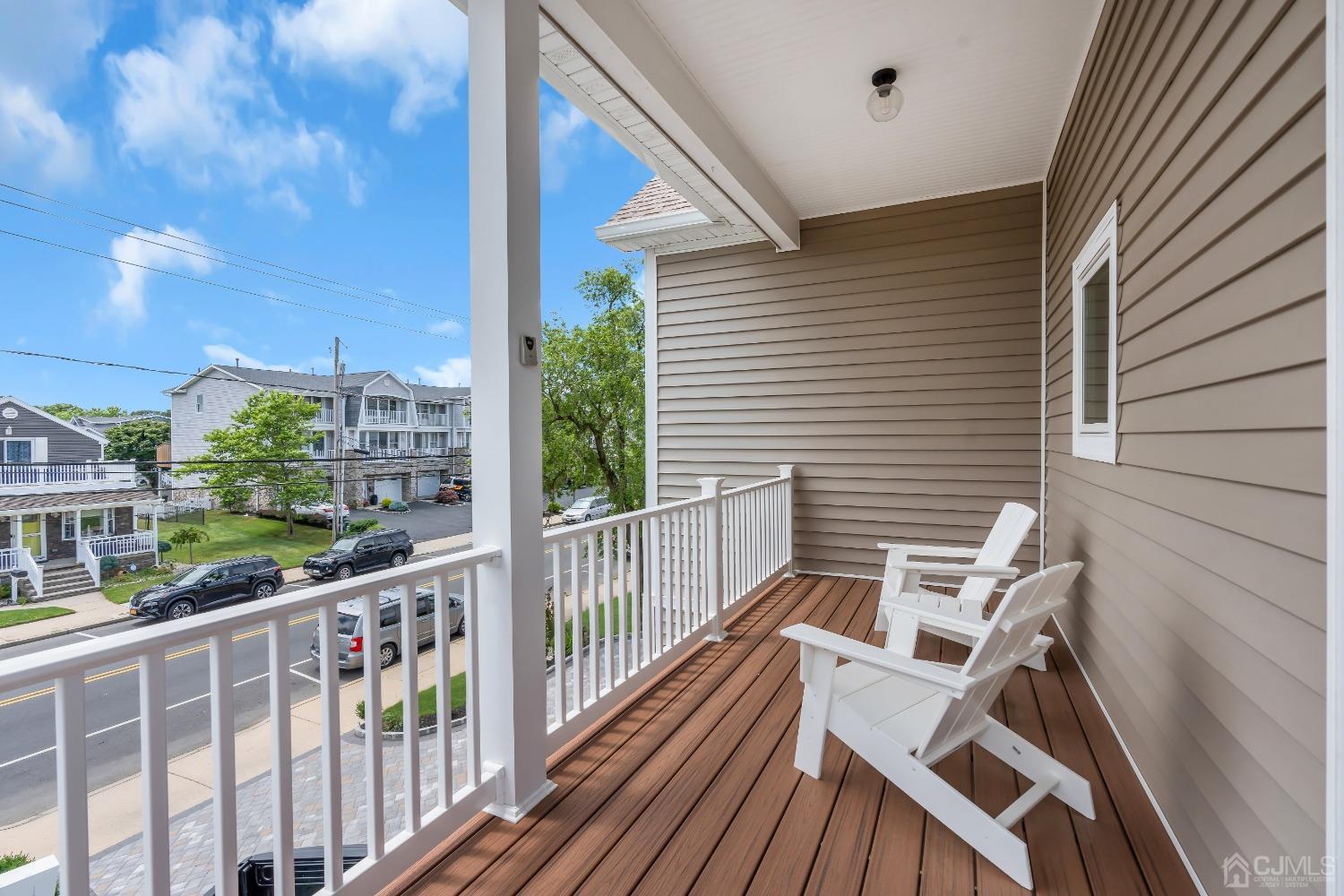 629 Front Street Union Beach, NJ 07735 - Photo 35 of 63 a view of a balcony with chairs