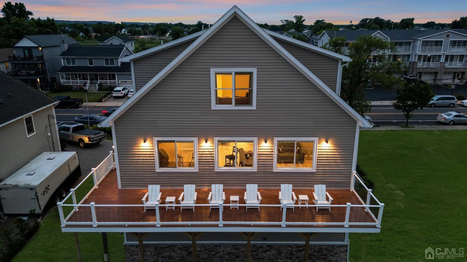 629 Front Street Union Beach, NJ 07735 - Photo 44 of 63 a front view of house and yard with green space