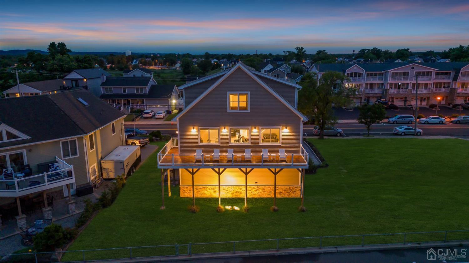 629 Front Street Union Beach, NJ 07735 - Photo 45 of 63 a view of a big yard next to a yard