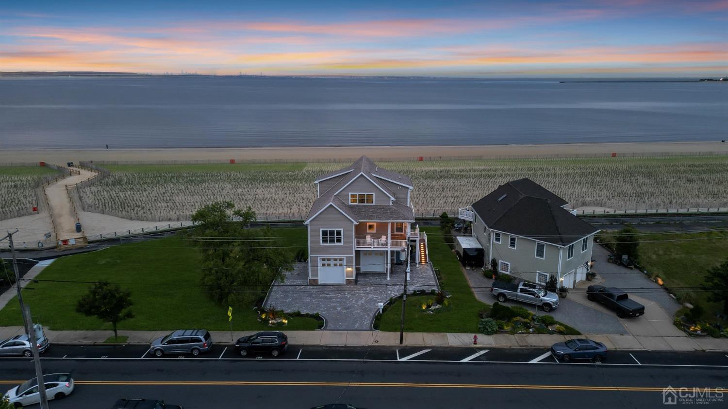 629 Front Street Union Beach, NJ 07735 - Photo 55 of 63 a picture of houses with outdoor space