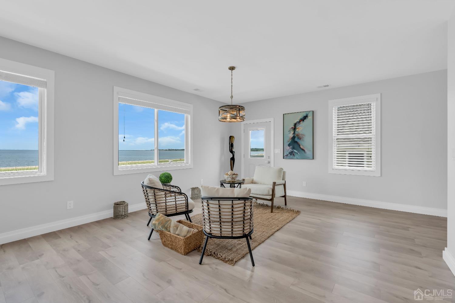 629 Front Street Union Beach, NJ 07735 - Photo 6 of 63 a living room with furniture and a window