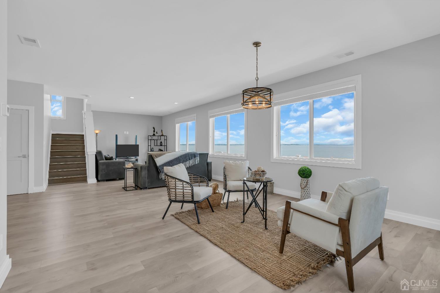 629 Front Street Union Beach, NJ 07735 - Photo 8 of 63 a living room with furniture and a window