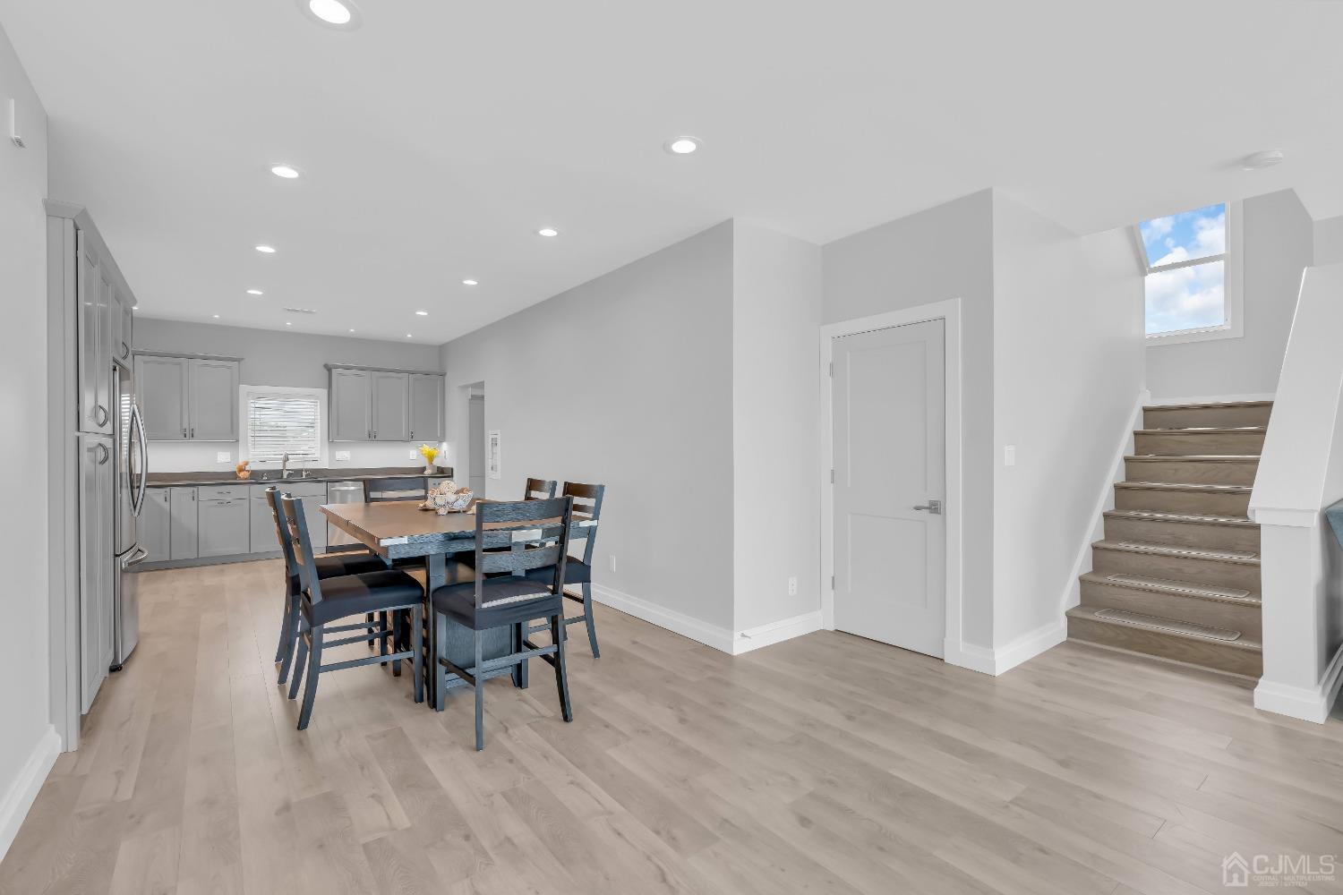 629 Front Street Union Beach, NJ 07735 - Photo 10 of 63 a view of a dining room with furniture and wooden floor