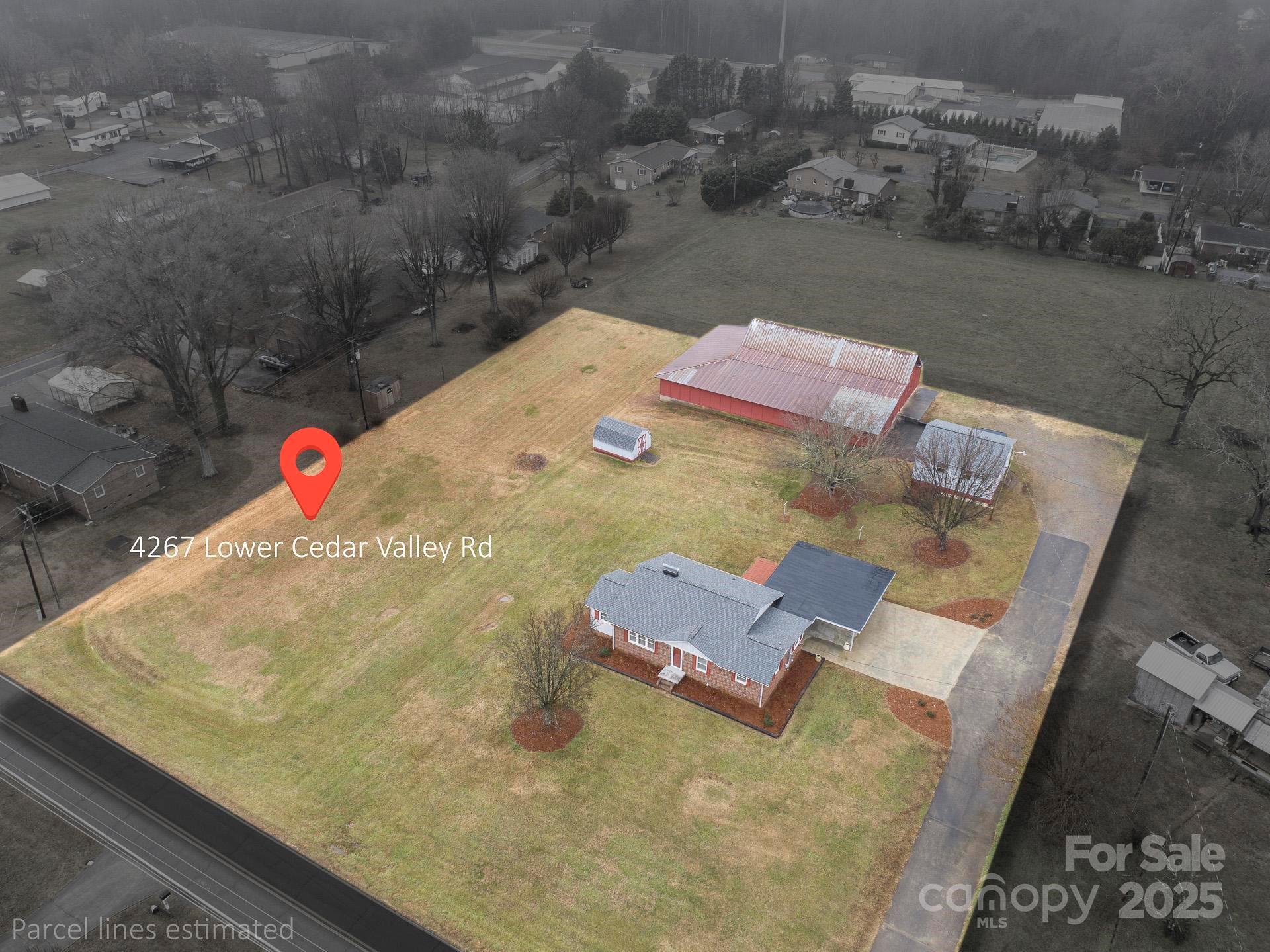 4267 Lower Cedar Valley Road Hudson, NC 28638 - Photo 3 of 45 an aerial view of residential houses with outdoor space