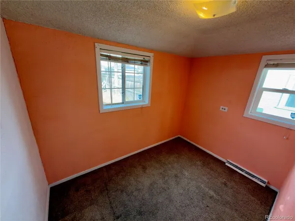 a bathroom with a sink and toilet