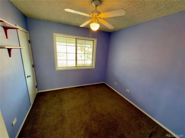 a view of an empty room with window