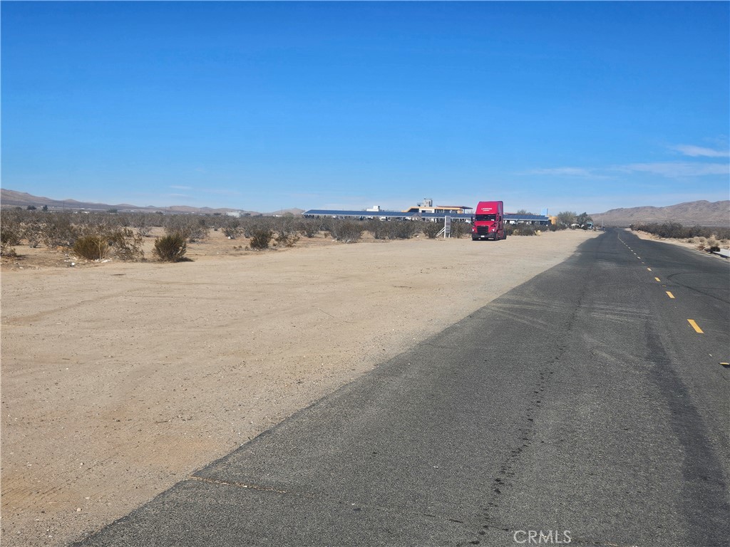 1 Navajo Road Apple Valley, CA 92307 - Photo 6 of 25 Street view of the Property from the Southeast corner.