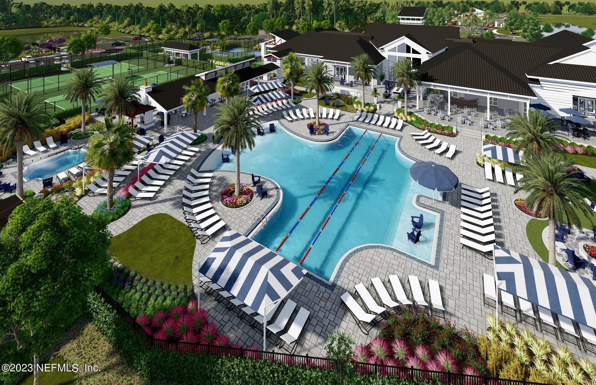 383 Jubilee Circle Yulee, FL 32097 - Photo 19 of 20 an aerial view of a house a yard and outdoor seating