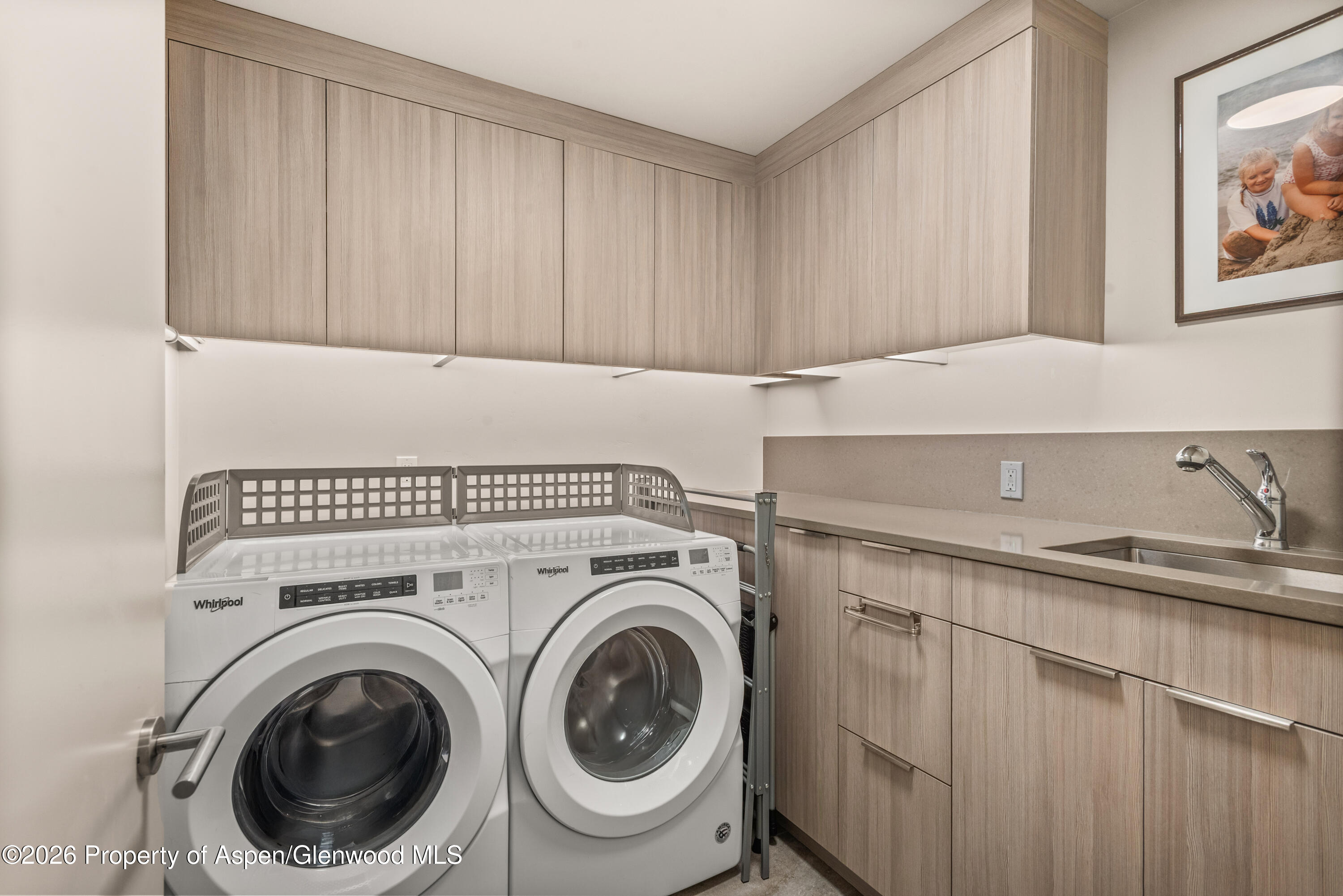113 Valley Court Basalt, CO 81621 - Photo 27 of 33 a utility room with dryer and washer