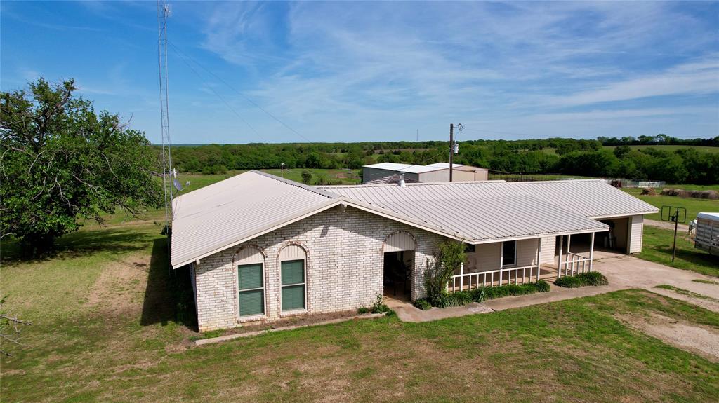 850 Gordonville Road Gordonville, TX 76245 - Photo 13 of 33 an aerial view of a house with porch yard basket ball court and trampoline