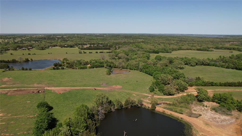 850 Gordonville Road Gordonville, TX 76245 - Photo 2 of 33 an aerial view of field with ocean view