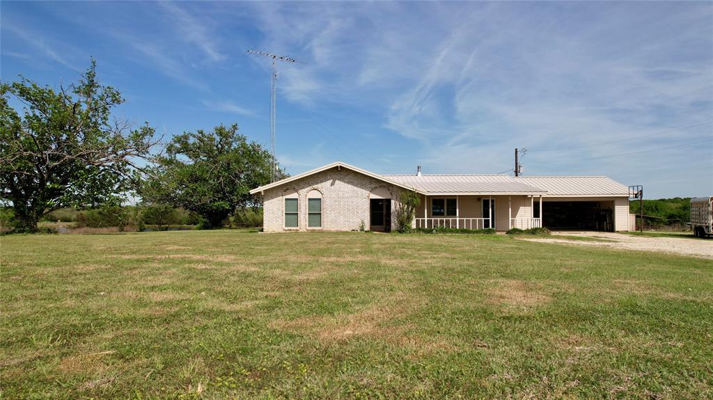 850 Gordonville Road Gordonville, TX 76245 - Photo 21 of 33 a house with trees in the background