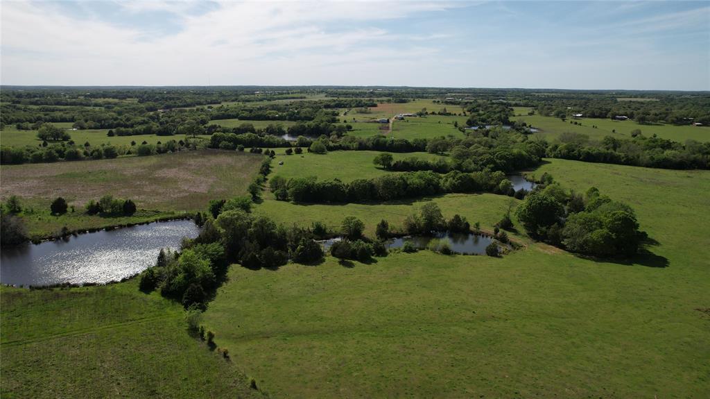 850 Gordonville Road Gordonville, TX 76245 - Photo 24 of 33 an aerial view of a town with residential houses and lake view