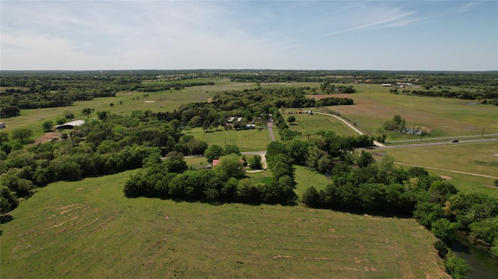 850 Gordonville Road Gordonville, TX 76245 - Photo 4 of 33 a view of a lake with houses in the back