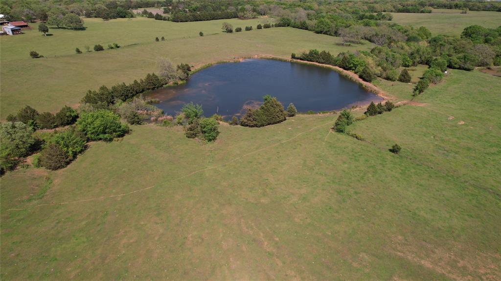 850 Gordonville Road Gordonville, TX 76245 - Photo 8 of 33 an aerial view of a house with a yard