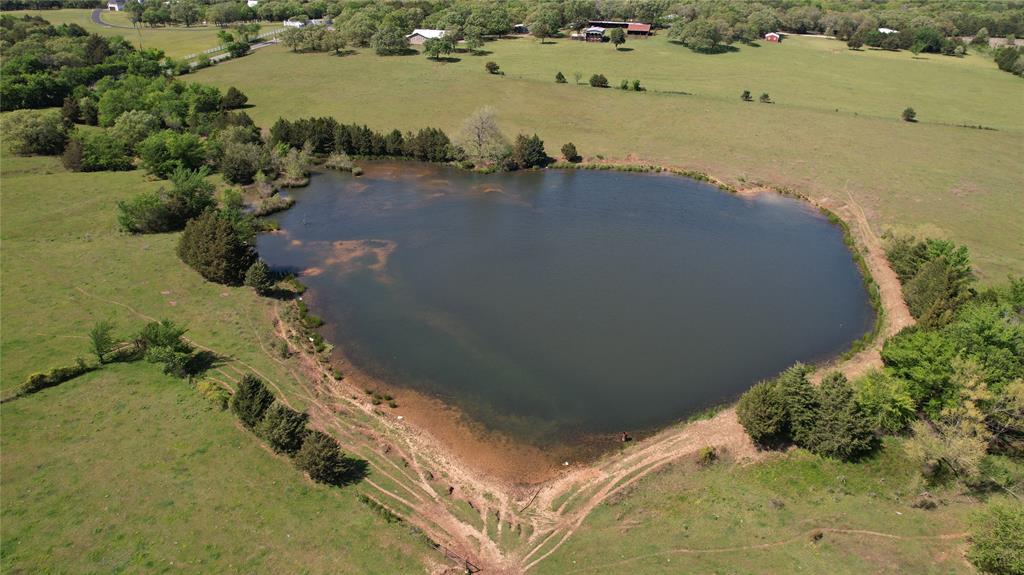850 Gordonville Road Gordonville, TX 76245 - Photo 9 of 33 an aerial view of ocean and residential houses with outdoor space