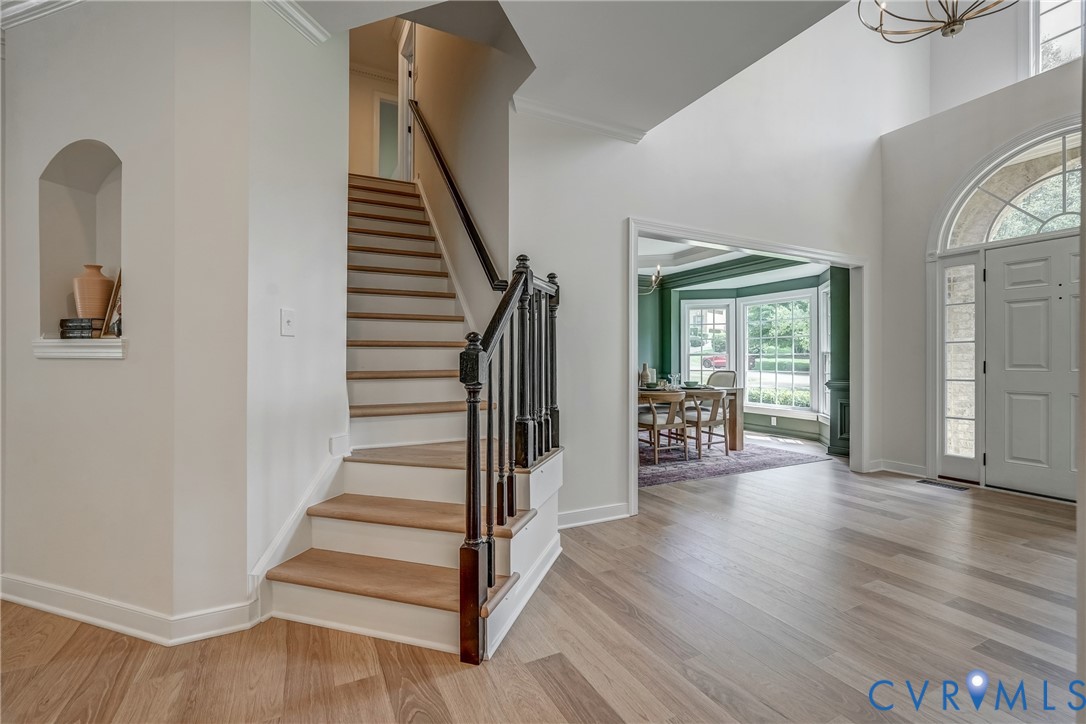 2306 Founders Bridge Road Midlothian, VA 23113 - Photo 11 of 50 a view of a hallway with wooden floor and stairs