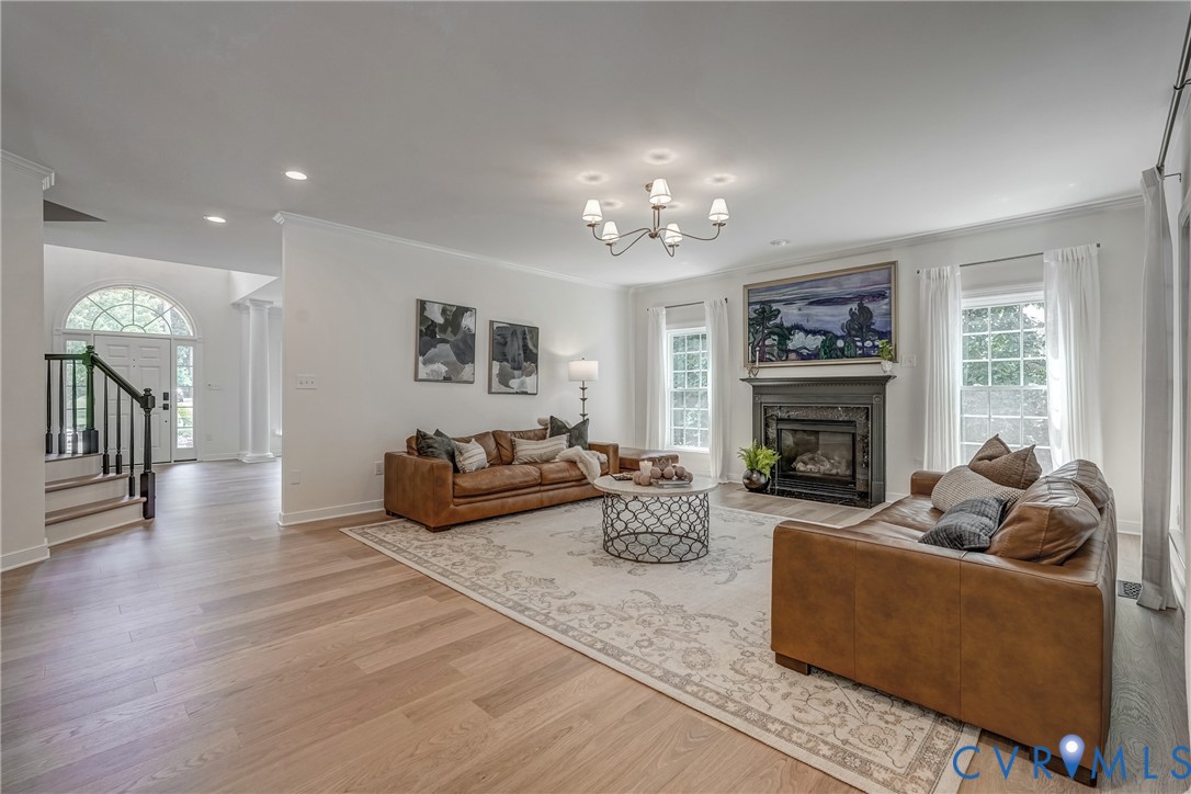 2306 Founders Bridge Road Midlothian, VA 23113 - Photo 15 of 50 a living room with furniture and a fireplace
