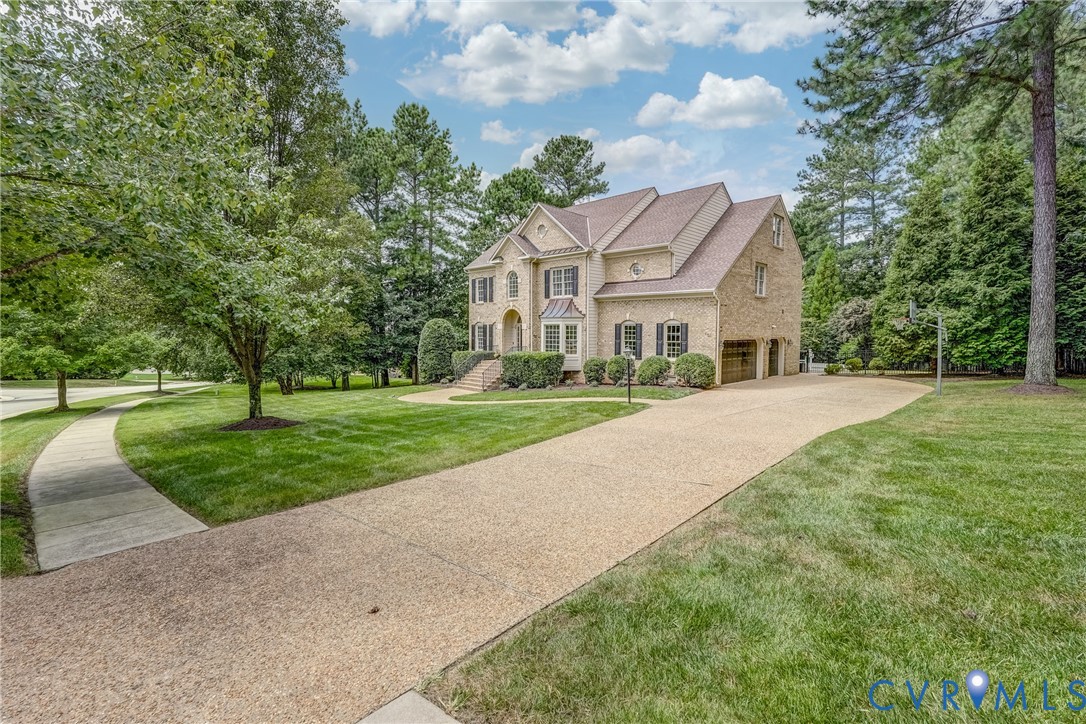 2306 Founders Bridge Road Midlothian, VA 23113 - Photo 2 of 50 a front view of a house with a yard