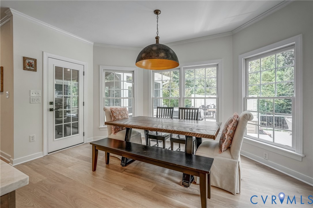 2306 Founders Bridge Road Midlothian, VA 23113 - Photo 22 of 50 a dining room with furniture window wooden floor