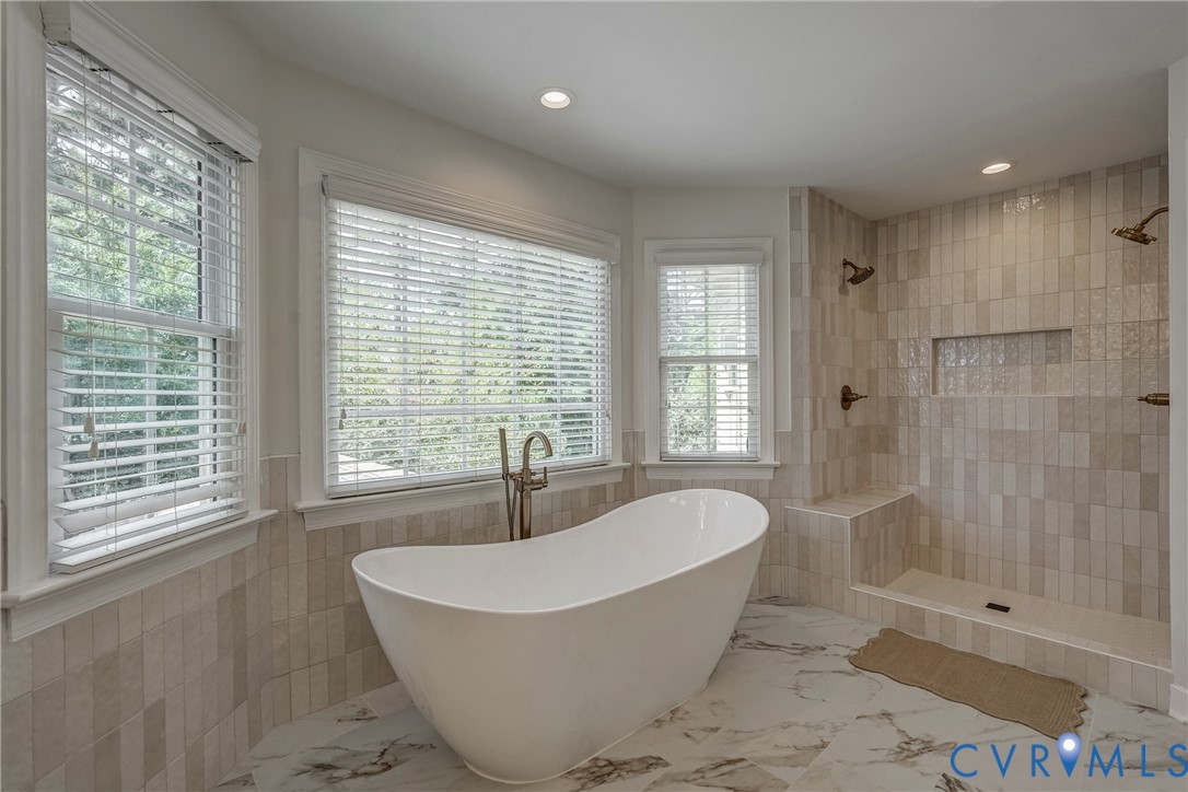 2306 Founders Bridge Road Midlothian, VA 23113 - Photo 33 of 50 a spacious bathroom with a bathtub and shower