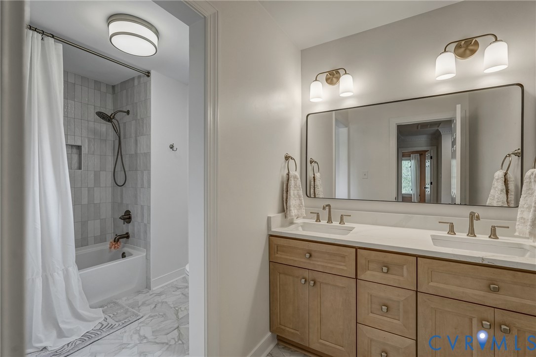 2306 Founders Bridge Road Midlothian, VA 23113 - Photo 35 of 50 a bathroom with a sink double vanity granite tub and shower