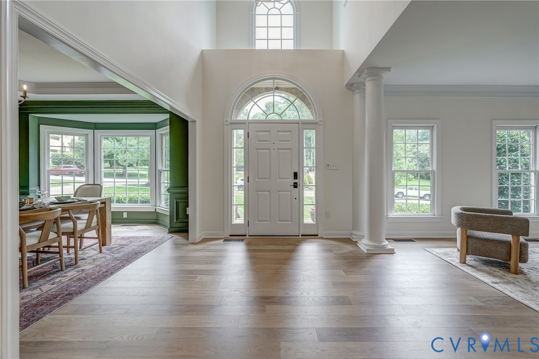 2306 Founders Bridge Road Midlothian, VA 23113 - Photo 4 of 50 a view of a livingroom with furniture hardwood floor and windows