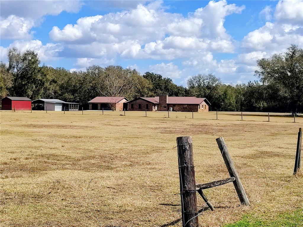 14240 State Rte 471 Webster, FL 33597 - Photo 22 of 54 a view of swimming pool with furniture
