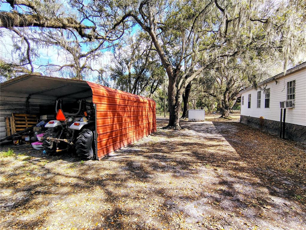 14240 State Rte 471 Webster, FL 33597 - Photo 25 of 54 a view of a backyard of the house