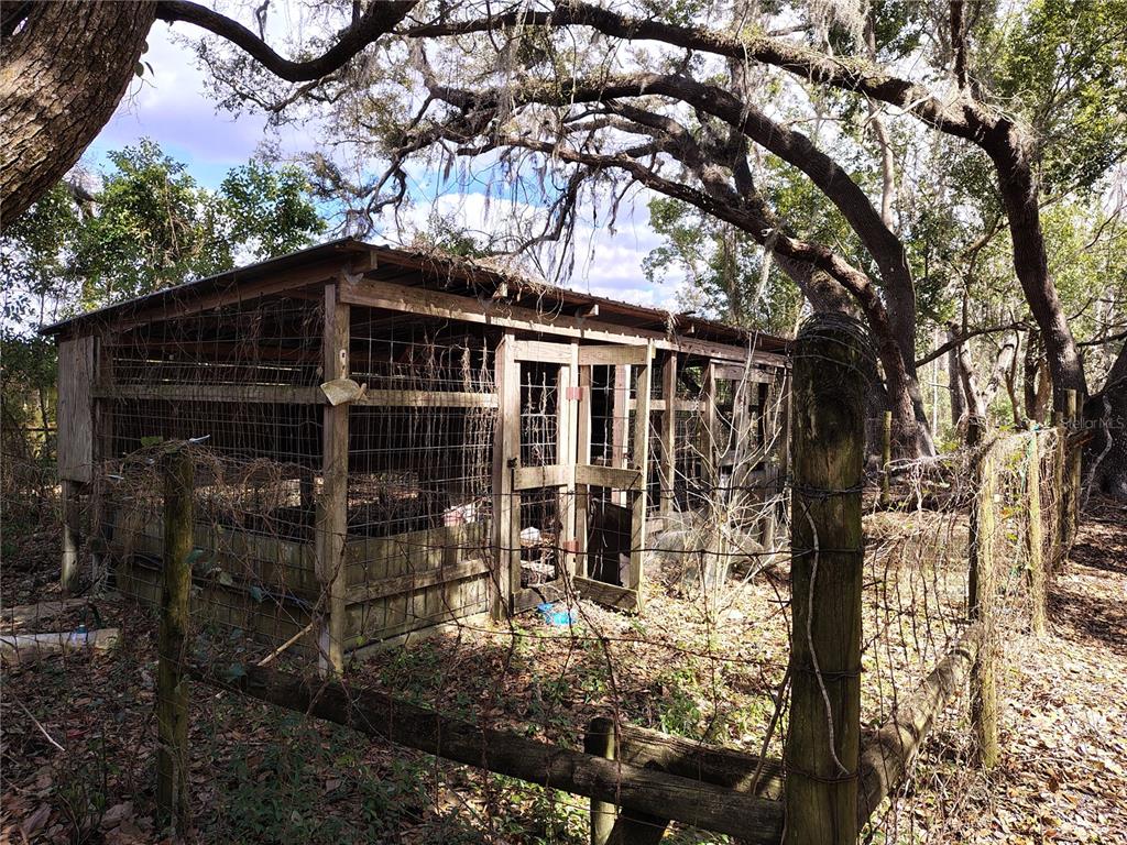 14240 State Rte 471 Webster, FL 33597 - Photo 46 of 54 a front view of a house with garden
