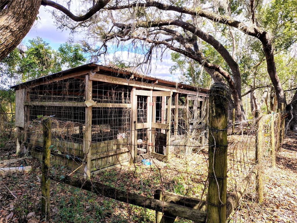 14240 State Rte 471 Webster, FL 33597 - Photo 5 of 54 a front view of a house with a yard