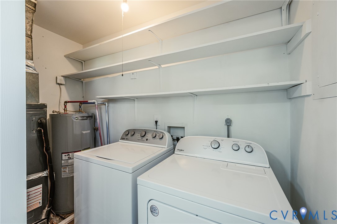 15412 Exter Mill Road Chesterfield, VA 23838 - Photo 57 of 66 Laundry area with water heater and washing machine