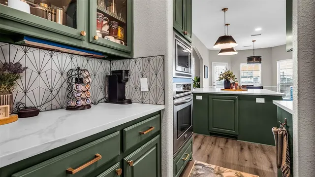 a dining room with furniture and wooden floor
