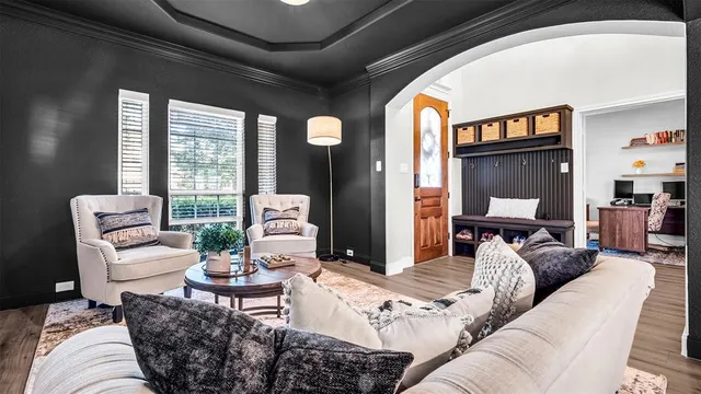 a bedroom with a bed and a couch