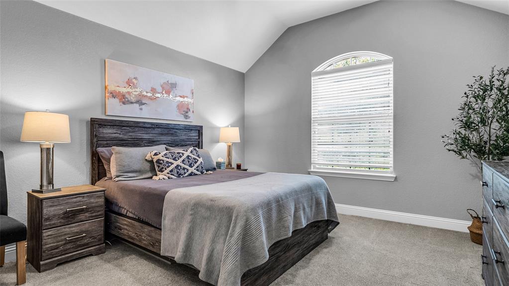3608 Acropolis Way Plano, TX 75074 - Photo 28 of 37 a bedroom with a bed and a window