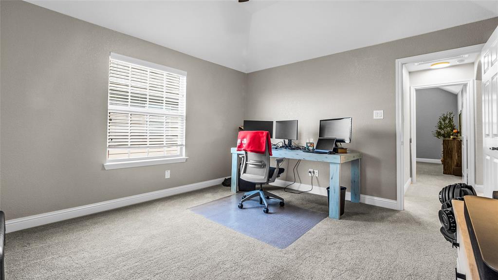 3608 Acropolis Way Plano, TX 75074 - Photo 30 of 37 a view of a livingroom with workspace and a window