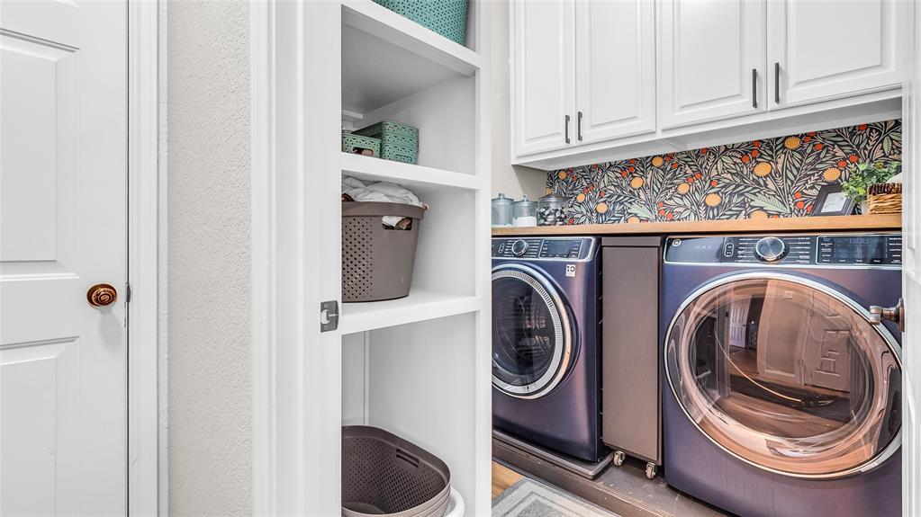 3608 Acropolis Way Plano, TX 75074 - Photo 32 of 37 a utility room with dryer and washer