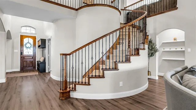 a kitchen with stainless steel appliances a sink and a refrigerator