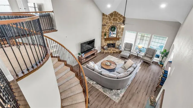 a view of a dining room with furniture wooden floor and a window