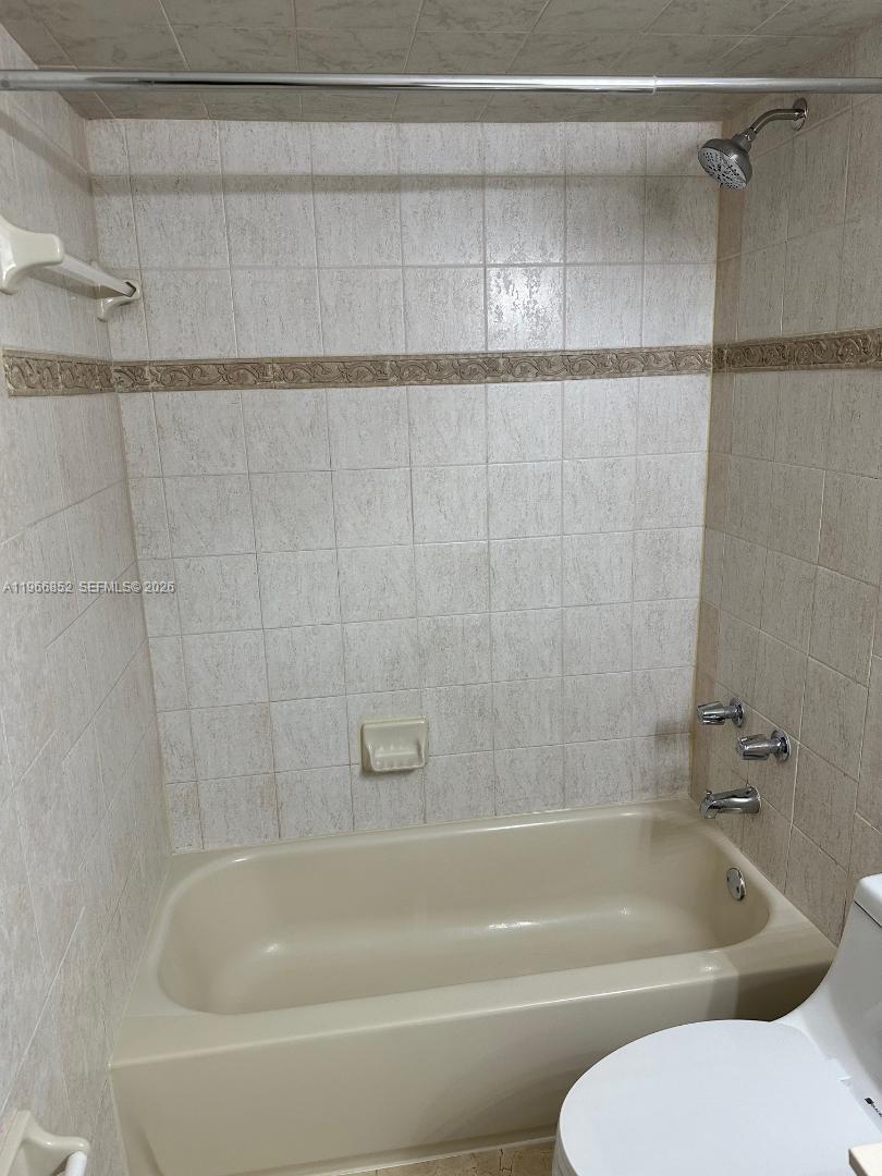 7205 West 3rd Avenue Hialeah, FL 33014 - Photo 23 of 28 a bathroom with a bath tub