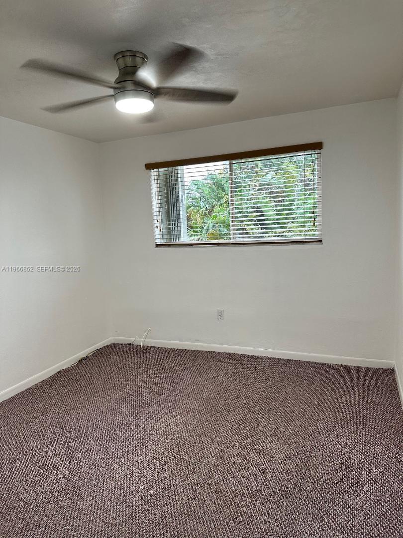 7205 West 3rd Avenue Hialeah, FL 33014 - Photo 25 of 28 an empty room with a window