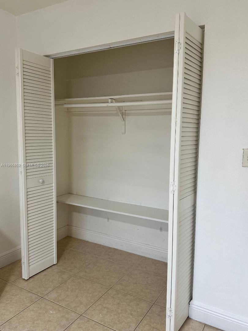 7205 West 3rd Avenue Hialeah, FL 33014 - Photo 28 of 28 a bathroom with a bathtub