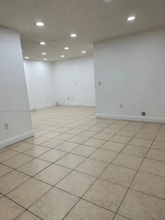 a view of a room with mirror