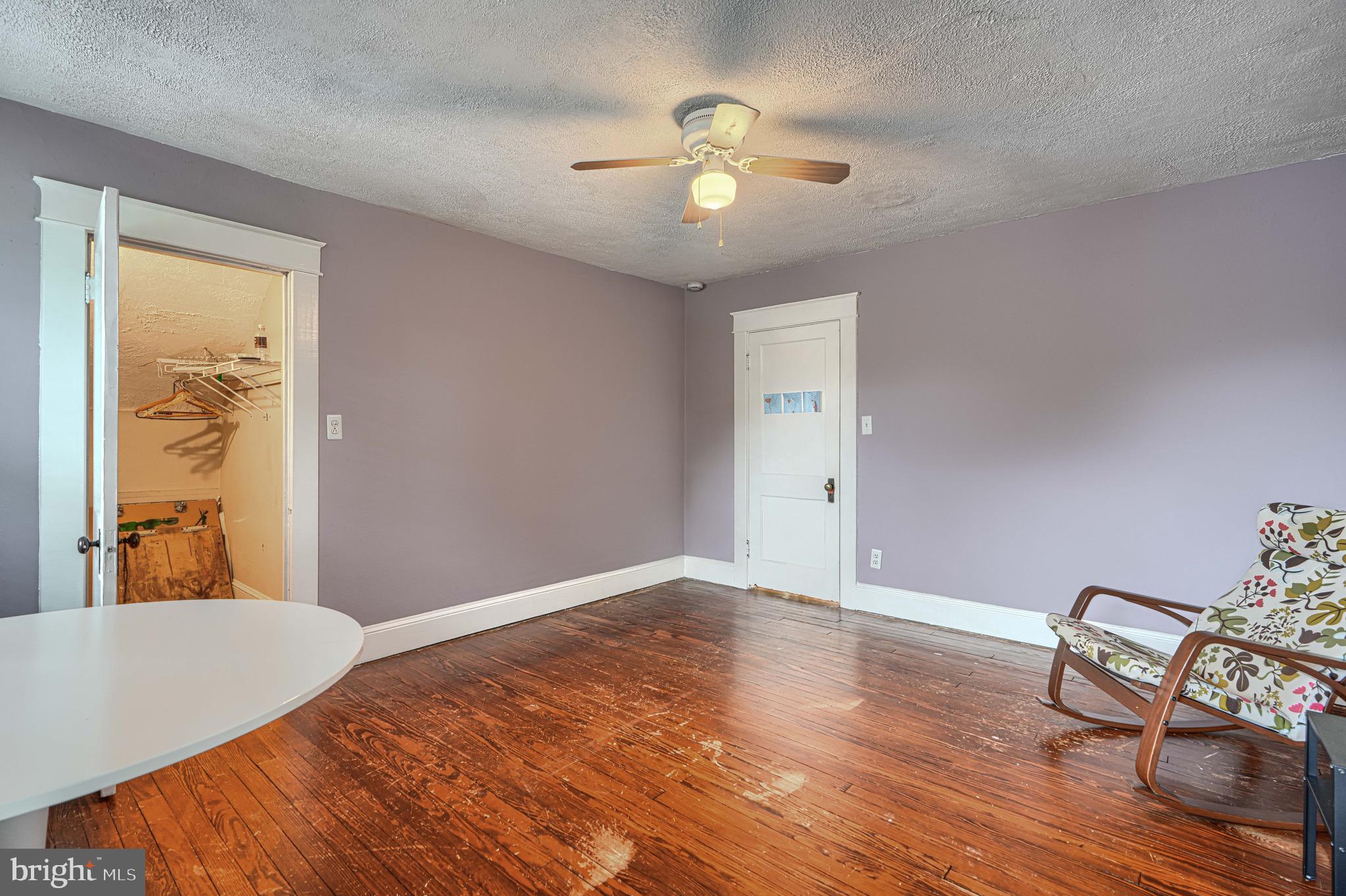 2705 Latona Road Baltimore, MD 21214 - Photo 36 of 53 a view of a livingroom with wooden floor