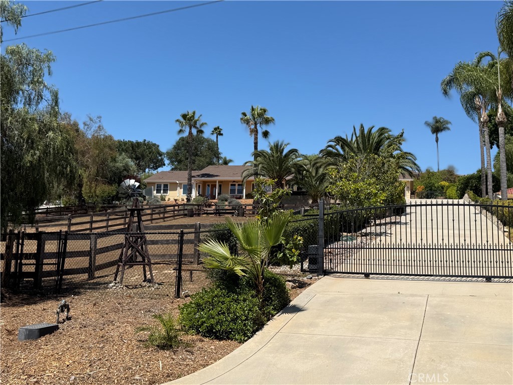 3839 Forbell Place Fallbrook, CA 92028 - Photo 1 of 98 Tucked behind a gated entry is this exceptional custom 2908 sq/ft home on 1.31 useable acres.