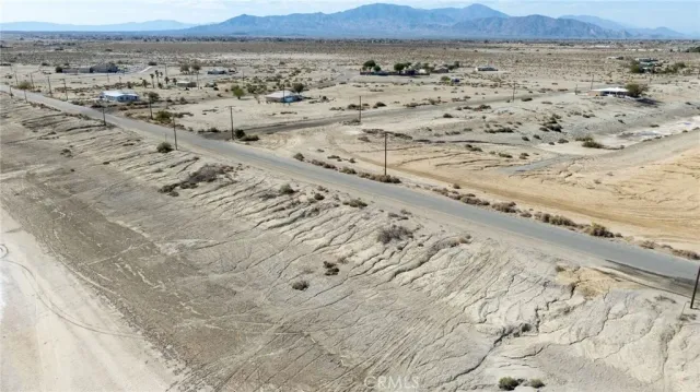 a view of ocean and mountain