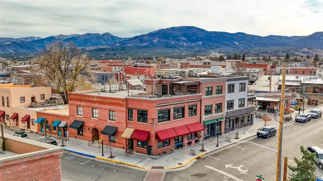 an aerial view of residential houses and city street