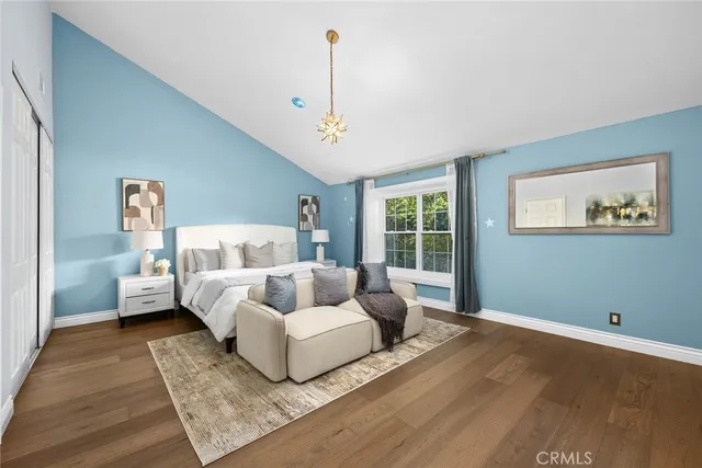 a bed room with a bed and a couch